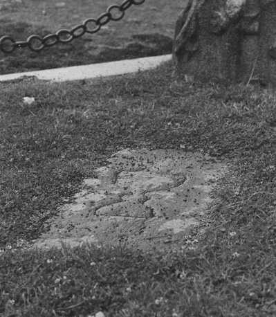 Site of the former cathedral (Place Daniel-Huet), detail: stone slab with chalice