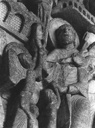 West portal, tympanum, detail left: Saint Peter and the Gate of Heaven