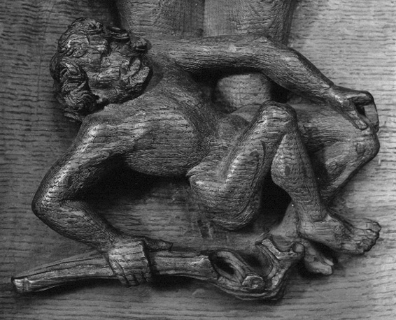 Koorbanken; misericorde met grotesk figuur