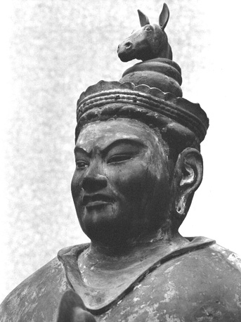 Kop van Jimmo Ten figuur (boodschapper van Kannon)