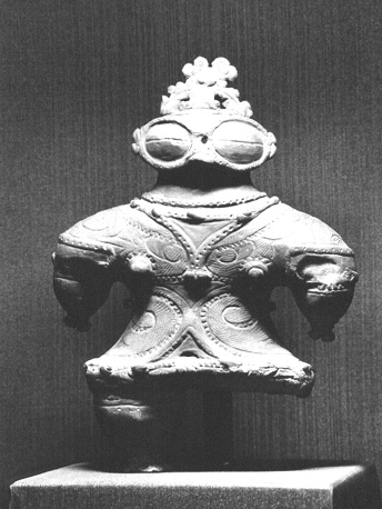 Aardewerk figuurtje (vrouwelijk)