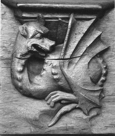 Koorbanken, detail: misericorde met draak