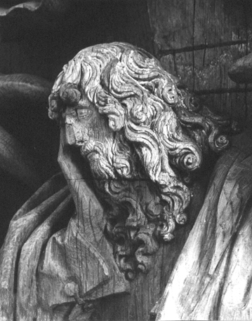 Koorbanken, detail: hoofd van (?)