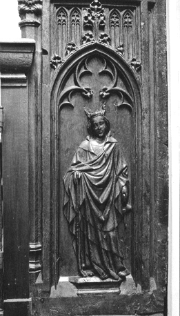 Koorbanken, detail: paneel met de heilige Catharina