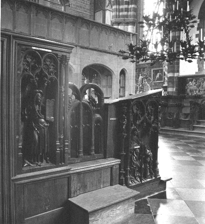 Koorbanken, detail: synagoge, geboorte van Christus, profeet