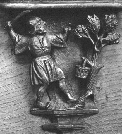Koorbanken, detail: misericorde, man met kromzwaard in opgeheven rechterhand en boom met mandje