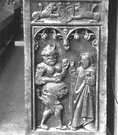 Koorbanken, detail: de verzoeking van Christus in de woestijn door de duivel
