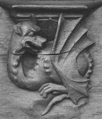 Koorbanken, detail: misericorde met draak