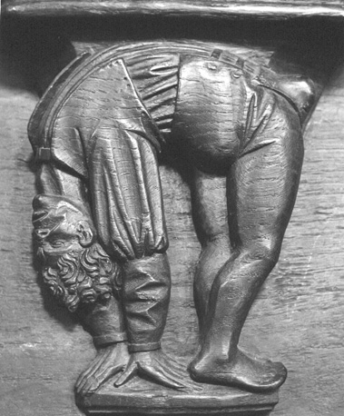 Koorbanken, detail: misericorde met acrobaat
