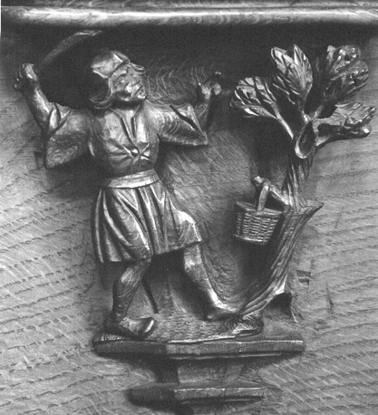 Koorbanken, detail: misericorde, man met kromzwaard in opgeheven rechterhand en boom met mandje