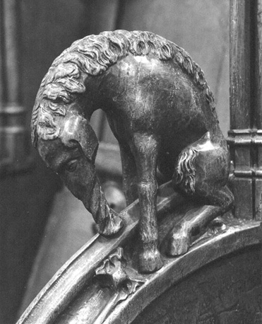 Koorbanken, detail: knop met een eenhoorn
