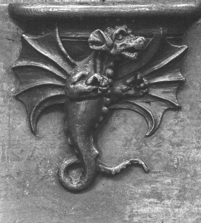Koorbanken, detail: misericorde met een draak