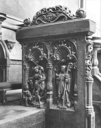 Koorbanken, detail: Michael vechtend tegen de draak (duivel) en de abdis Gertrudis van Nivelles