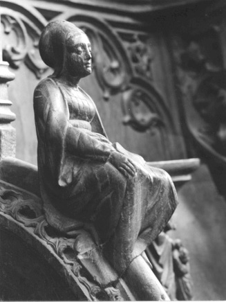 Koorbanken, detail: knop met een Sibylle