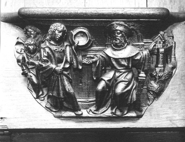 Koorbanken, detail: misericorde met Jacob die Jozef een deel land meer geeft dan zijn broers