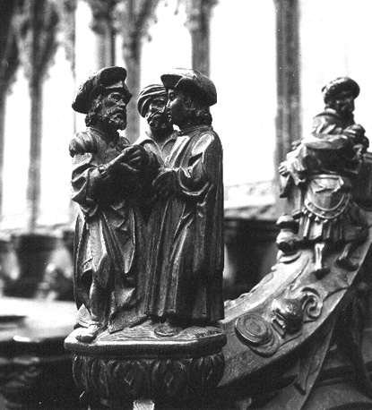 Koorbanken, detail: knop met drie mannen uit het Oude Testament