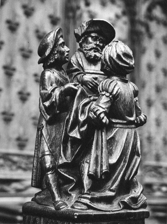 Koorbanken, detail: knop met drie mannen uit het Oude Testament