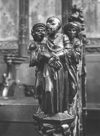 Koorbanken, detail: knop met Samson die door twee soldaten gevangen wordt genomen