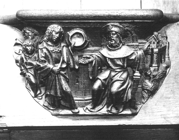 Koorbanken, detail: misericorde met Jacob die Jozef een deel land meer geeft dan zijn broers