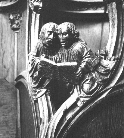 Koorbanken, detail: knop met twee koorknapen