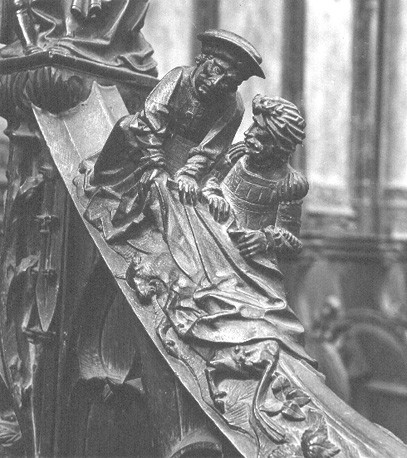 Koorbanken, detail: knop met de broeders die Joseph's rok in het bloed van een geitenbokje dopen