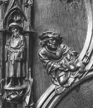 Koorbanken, detail: staand persoon en zittend persoon met een draak
