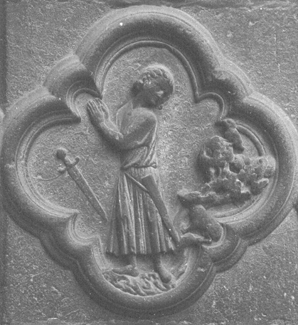 Westfacade, middenportaal;  vierpas met een afbeelding van de lafheid