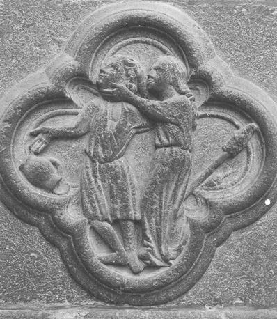Westfacade, middenportaal;  vierpas met een afbeelding van de tweedracht