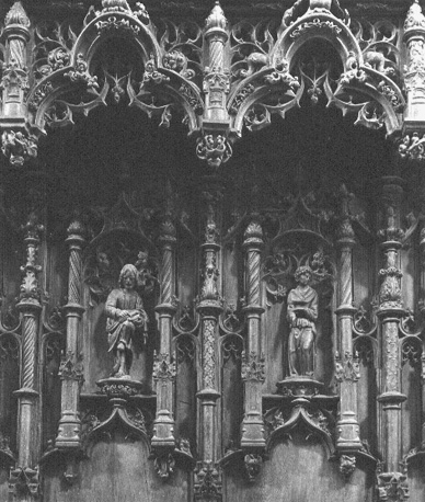 Detail koorbanken, zuidzijde: scenes uit Oude Testament en ornament van architectuurdetails