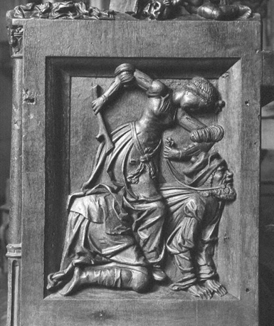 Koorgestoelte, ornamenteel reliëf: Aristoteles en Campaspe (Phyllis)