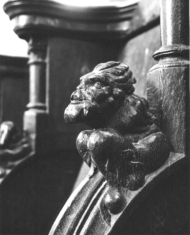 Koorgestoelte, detail: menselijk figuur