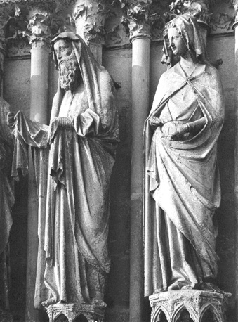 Westfacade, middenportaal, linker portaalwang: Presentatie van Christuskind in de tempel, detail: Simeon en begeleidster van Maria