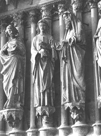 Westfacade, middenportaal, linker portaalwang: Presentatie van Christuskind in de tempel, detail: Jozef, Maria en Simeon