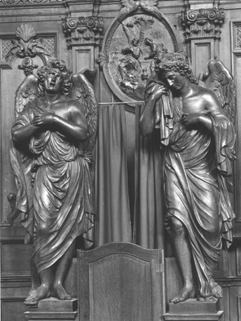 Biechtstoel: twee engelen