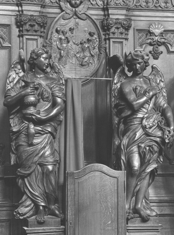 Biechtstoel: twee engelen