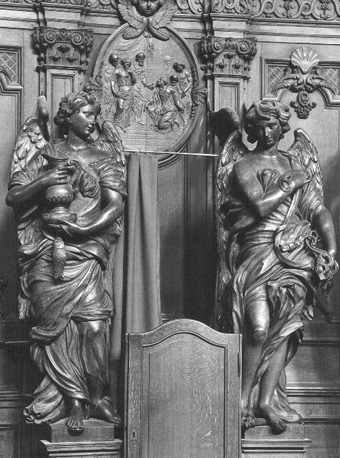 Biechtstoel: twee engelen