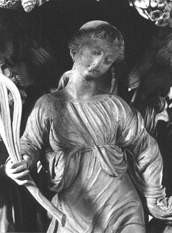 Preekstoel, detail: vrouwenfiguur