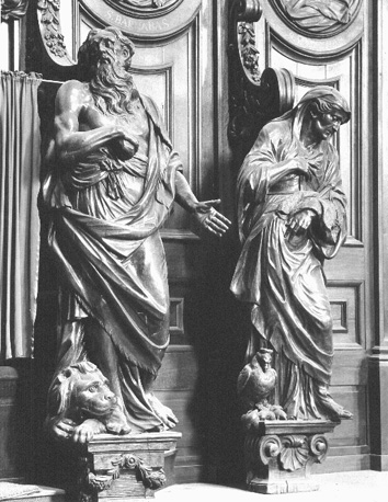 Biechtstoel met twee beelden: sint Hiëronymus (met leeuw) en een personificatie van waakzaamheid (mensenfiguur met haan)