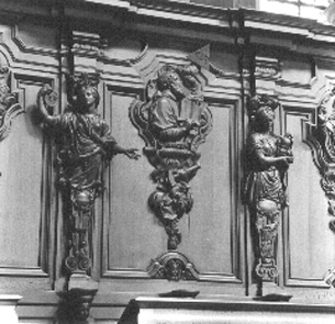 Koorgestoelte in noordelijke kant van koor, houten paneel: sint Augustinus