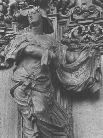 Koorgestoelte, detail: heilige Veronica met zweetdoek met beeltenis van Christus