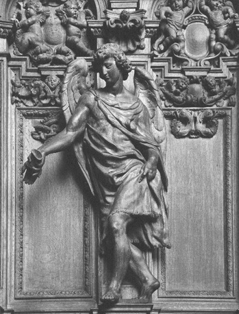 Koorgestoelte, detail: Engel met Passie-instrument: een hand