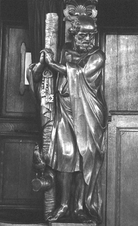 Biechtstoel: beeld van apostel Petrus met haan en sleutels