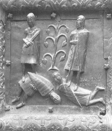 Westfacade, bronzen deuren met reliëfs, detail: twee ridders staand op twee andere (dode) mannen (Overwinning van de deugden op de ondeugden)