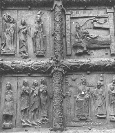 Westfacade, bronzen deuren met reliëfs, 4 vlakken: Doop van Christus; Annunciatie; Geboorte van Christus;