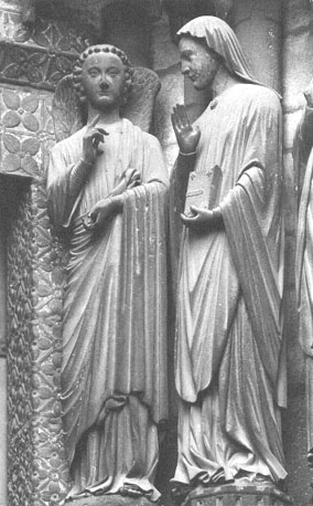Westfacade, zuidportaal, rechter portaalwang: Engel der Annunciatie, Maagd Maria