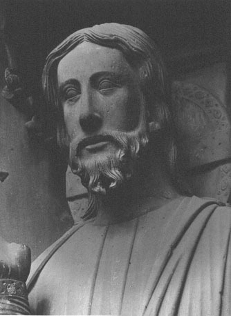 Zuidtransept, middenportaal, trumeau: hoofd van Christus