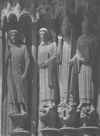 Zuidtransept, linker portaal, linker dag-kant: beelden van de heiligen Theodorus, Stephanus, Clemens en Laurentius