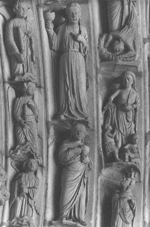 Noordtransept, linker portaal, archivolten boven timpaan: detail