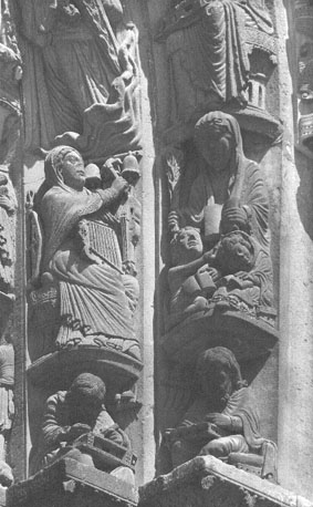 Westfacade, Portail Royal, rechter portaal, archivolten: 'Musica', Pythagoras, 'Grammatica' en Donatus