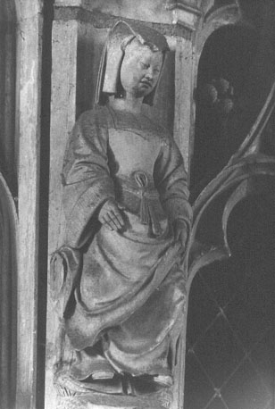 Koorafsluiting, detail: vrouwelijk figuur (op een portaalwang)